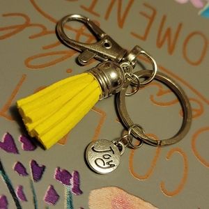 Joy charm Keychain with yellow tassle